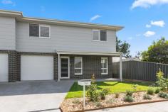 58A Byamee Street Dapto NSW 2530 $750,000 - $800,000 Near new & quality built, this townhouse's stylish spaces and easy low maintenance design are enhanced by its location to the local amenities. Style, light and quality features throughout this beautifully presented complex of only 2 townhouses. Great for owner occupiers or a low-care investment, this peaceful neighbourhood is within an easy stroll to the Dapto CBD, shopping centre, parks, schools transport all close by. Bright and airy open plan design that leads easily to the outdoors Polyurethane kitchen with dishwasher and quality appliances Main with ensuite and WIR, two bedrooms are each fitted with built-in wardrobes Deluxe main bathroom with separate toilet plus an extra downstairs WC Ducted air conditioning throughout Single remote controlled garage, off street parking Private entertaining courtyard, low maintenance lawns and gardens Situated moments from the Dapto CBD, schools, swimming pool, shops and transport Ideal first home or investment property