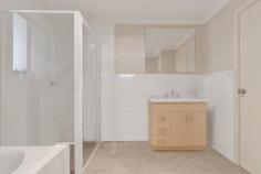 Unit 1/69A Rawson St Aberdare NSW 2325 $450,000 - $460,000 – Fantastic brick and tile duplex located in the heart of Aberdare – Modern kitchen with gas cooktop, electric oven and plenty of cupboard and bench space – Open plan carpeted living room with A/C, that opens to the sunny courtyard – Tiled dining space off the kitchen – Two generous bedrooms both with ceiling fans and built in robes – Clean and tidy bathroom with separate shower and bath, access to the bathroom from the main bedroom – Single garage with electric roller door that contains the laundry – Low maintenance living with courtyards to the front and back of the home – Currently leased to a dream tenant to the end of July 2024 – Fantastic downsizer, first home or investment opportunity with rental potential at $450/week