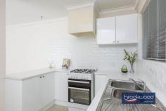 36B Stuart St Koongamia WA 6056 $449,000 Prepare to have your head turned and heartstrings plucked by this bright, uncomplicated property. Set beside the much-loved Heritage Trail and boasting a large, private backyard, this impeccably presented home is an excellent entry point to the property market, a wonderful downsizer and an unparalleled first home. 2 bedrooms 1 bathroom 1984-built brick and tile Open-plan kitchen & living Fresh light colour palette Split AC & gas bayonet Drive-through side access No-fees strata property Big fully fenced backyard 520 sqm level block Trail-side location A well-tended front garden planted with roses and lavender sets this home back from the road, and a driveway along one boundary leads through a gate to the fully fenced backyard. The garden surrounding the house is a surprise and a delight, offering outdoor living and entertaining in a fantastic setting, adjacent to the bridle trail. This property’s appeal grows as you step from the welcoming front porch into an open-plan kitchen, lounge and meals area. Good proportions, a fresh neutral colour palette and loads of natural light fashion an instantly welcoming sense of home. Dual-aspect glazing and a flowing floorplan heighten the sense of space and create a seamless link to the large backyard. The lounge sits at the front of the plan, with views of the front garden and modern sculpture lining the path of the Heritage Trail. Carpet and a gas bayonet add to a sense of comfort in the lounge, while the meals and kitchen have vinyl flooring. The kitchen has been updated and is a simple and practical space with glossy white cabinetry and tiled splashback, a freestanding oven, and a built-in pantry. A door from the kitchen leads to the small rear patio and generous backyard featuring a level lawn edged with garden beds, established trees, and a garden shed. One side of the plan has bedrooms arranged to the front and rear, with the main at the front featuring reverse-cycle air conditioning and a freestanding robe. The family bathroom and walk-through laundry with a separate WC sit between the two bedrooms off a hallway with a large linen press. Garden views bring a pastoral charm to the rear bedroom. Koongamia offers a magical mixture of foothills adventure and city convenience. This truly impressive and charming property combines easy access to Midland and beyond, hours of walking and riding along the Heritage Trail, and the convenience of nearby private and state schools. Surrounding streets are lined with lovingly renovated and renewed homes in an interesting and exciting neighbourhood experiencing a renaissance.