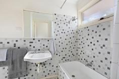 1/11 Wisewould Avenue Seaford VIC 3198 $480,000 - $520,000 Located on the fringe of Frankston's bustling CBD, this two-bedroom unit is ideal for those desiring private space without giving up urban living benefits. With Long Island and Seaford Beach right at your doorstep, it offers a coastal lifestyle enriched by a practical, original design. Step inside to a bright living and dining area, ready for you to move straight in or personalise. The kitchen features a combined oven and cooktop, nestled in timber-finished cabinetry. The home includes two generous bedrooms and a shared bathroom, accommodating both family and guests comfortably. Enjoy hassle-free gardens, split-system heating and cooling, a single carport, secure brick storage shed, new carpets and blinds throughout. This unit also offers a true community feel amongst its wider complex.