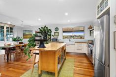48 Gwinganna Avenue Kiama NSW 2533 $1,700,000 - $1,800,000 Capture the essence of your new oasis in Kiama, close to Kendalls beach with this captivating four bedroom, two bathroom family home. Boasting a spacious open-plan living area that seamlessly connects to a generous front balcony from the kitchen and dining space through to the lush backyard, it is an ideal setting for entertaining guests, unwinding with loved ones or simply relaxing. Key features include: Four bedrooms with built-in wardrobes Separate teenage retreat, currently being run as a boutique holiday stay Serene backyard with a large entertaining patio Small orchard with thriving fruit trees and vegetable gardens Large North-West facing balcony offering picturesque views of rolling hills and Saddleback Mountain Elegant hardwood flooring throughout Nestled in this exclusive, tightly held beachside pocket in Kiama, this residence harmoniously blends indoor comfort with outdoor allure. Whether hosting a summer BBQ or enjoying a peaceful winter sunset, this home provides the perfect backdrop for every occasion.