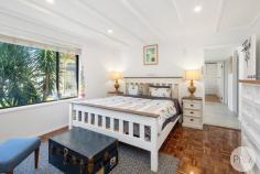2 Wards Way Salamander Bay NSW 2317 Just 100 meters from the water's edge, this delightful 3-bedroom cottage is nestled on a spacious 696m² flat lot in the highly sought-after pocket near Foreshore Beach. Offering both comfort and style, this home is perfect for those seeking a tranquil coastal lifestyle. Inside, the cottage features three cozy bedrooms, including a main bedroom with an ensuite, providing a private retreat for the homeowner. Each bedroom is designed with comfort in mind, ensuring restful nights and peaceful mornings. The heart of the home is the kitchen, a true culinary delight, equipped with 90cm SMEG gas cooktop and ample counter space, perfect for those who love to cook and entertain. The living areas are equally inviting, with a warm and cozy ambiance that makes you feel right at home with its internal fireplace and Large windows throughout the house allows natural light to flood the space, creating a bright and airy atmosphere. The open-plan design of the living and dining areas ensures a seamless flow, ideal for both everyday living and entertaining guests. Step outside to discover the private balcony overlooking the beautifully maintained grassy front and back yards. These expansive outdoor spaces provide ample room for children to play, pets to roam, or for hosting memorable gatherings with family and friends. With its proximity to the water and level block, the possibilities are endless. Don't miss out on the opportunity to own your slice of coastal paradise. Embrace the seaside lifestyle you've always dreamed of!