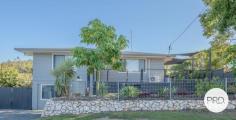 13 Marina Avenue Boyne Island QLD 4680 $490,000 This home has been beautifully renovated with a modern feel throughout. Positioned in a quiet area in Boyne Island with river glimpses from the front patio. With a massive concrete carport approximately 4m high by 14metre there is plenty of room for a motor home, large caravan, boats plus more! - the opportunities are endless. The house has plenty of space with 2 bedrooms upstairs, extra room or office downstairs with approved 1 bedroom granny flat. The property is within minutes to local sporting fields, golf course and bowls club with school bus pick up available . Minutes to Tannum Sands beaches, shopping centres and local schools plus Boyne Island boat ramp for all your fishing needs. Property Highlights: - Large tiled open plan living with air conditioning and ceiling fan - Beautiful modernized kitchen with dishwasher, large oven, pantry, tiled back splash, black feature handles and beautiful white glossy cupboards - Master bedroom with vinyl plank flooring, built in robe, ceiling fan, box air conditioning - Bedroom 2 with vinyl plank flooring, ceiling fan, and built in wardrobe - Renovated bathroom with heated towel rack, shower vanity & toilet - Great entertainment deck wrapping around the side of the house with a river glimpse - Laundry located downstairs - additional room or office (space for a home gym) - Massive concrete carport with ample space for boats, caravans, cars etc - Approved granny flat located under the carport with a bedroom and bathroom plus added plumbing if you wanted to put in a kitchen - Fenced large backyard with side access
