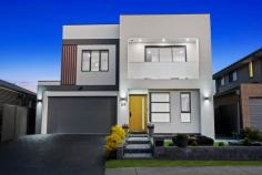 58 ARNCLIFFE Avenue MELONBA NSW 2765 Near New Architecturally Designed this spacious double-storey home is an entertainer's dream. sitting on a high side of the street designed with sleek contemporary aesthetics which is ultra-modern in concept and warmly inviting. * 2 years young house with builder warranty. * Spacious wide entry foyer via large doors. * Massive light filled open plan dining & living zone. * Additional Study Room and Puja Room.. * Sleek & stylish kitchen features large island bench with 60mm Caesarstone tops and waterfall edging, quality stainless steel appliances, gas cooking, dishwasher and built-in microwave oven. * Generous study / home office. * Huge master suite comprises of large walk-in robe and palatial ensuite with freestanding bathtub and vanity . *Modern Balcony with view. * Second luxurious bedroom downstair. * Modern family bathroom with freestanding bathtub with toilet. * Automatic double lock up garage with internal access, and Epoxy Floor. * 4 indulgent bedrooms with walk-in robes. * 3 ultra modern bathroom with stone-top vanity, bath and shower. * multi-zone ducted air-conditioning ensure this home sets a benchmark for comfort, style and conscience. * Down-lights throughout the home. * Huge, secure back yard. * outdoor gas cooking with Alfresco area. * Solar Panels. Short Drive to Business Park - Costco, Ikea, Bunnings Walking Distance to Lake , playing fields & Coles shopping centre.