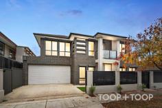 12 Vauxhall St Croydon Park SA 5008 Introducing a magnificent double storey sensation oozing uncompromising style and low maintenance living, all in such a convenient locale. Executed to a spectacular standard, grand design spans two spacious light filled levels comprising of up to four bedrooms, three stylish bathrooms, formal lounge room, open plan living, kitchen and dining, upstairs retreat, outdoor entertaining, and a double electric lock-up garage. A showpiece of bold contemporary design, this creatively designed home is ready for immediate enjoyment. The avid entertainer can enjoy hosting with an outdoor alfresco flowing from the open plan or during the cooler months retreat to the front formal lounge space. Mixed with established, yet low maintenance gardens, this is the perfect home for the busy family or keen investor. Make no mistake, all the highly sought-after extravagant credentials are here, so don’t miss your opportunity to step securely and stylishly into a prime city-fringe abode. Features to note: • Fully fenced home with motorised front gate • Lock-up pedestrian gate • Ducted reverse cycle air conditioning (touch zone pad) • Electric window shutters throughout • Electric lock-up double garage • Three living spaces • Breakfast bar to kitchen island bench • Smeg gas cook top • Smeg electric oven • Dual sink • Microwave alcove • Walk-in pantry • Understairs storage • Built in robes to three bedrooms • Waterfall shower head to all bathrooms • Full sized bathtub upstairs • Walk-in robe and ensuite to master bedroom • Dual basins and dual shower heads to ensuite, as well as additional retractable shower hose • Private balcony to upstairs retreat • Outdoor undercover alfresco • Orange tree to rear • Easy-care gardens Shopping: • Churchill Shopping centre, including Costco • Welland Plaza Shopping Centre Nearby Attractions/Entertainment: • Regency Park Golf course • HOYTS movie theatre • 7-minutes to the leafy streets of North Adelaide • Under 10 minutes to the bustling CBD • 15 minutes from the golden sands of Henley Beach Food & Drink: • Brewboys Brewery & Tap Room • Croydon's famous Queen Street Scene with café’s and boutique stores Schooling: • TAFE SA Regency Campus • Adelaide and Torrens University minutes from home • Zoned to Woodville High School • Kilkenny Primary, Challa Gardens Primary and St Margaret Mary's Catholic School are within easy walking or cycling distance. Transportation: • Days Road, Regency Road, and Torrens Road offering ample bus stops • An 18-minute stroll to West Croydon train station