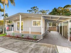Unit 2/437 Wards Hill Rd Empire Bay NSW 2257 This brand new two-bedroom home is located in the Bayside Gardens Lifestyle Village. The home is immaculately presented with laminate flooring through the living spaces and carpet in bedrooms. The home features include; - Two good sized bedrooms both with fitted built in robes and ceiling fans - A designer kitchen with loads of cupboard and bench space, soft close cabinetry, large breakfast bar, dishwasher, microwave space and gas cooking with electric oven - The lounge and dining space is open planned with split system air conditioning for heating and cooling - The Bathroom has a frameless shower screen, wall hung vanity & shaving cabinet, toilet and quality fixtures and fittings - A separate laundry with storage cupboard and second toilet accesses the courtyard and clothes line - A private veranda and single carport for the motor vehicle and garden shed for storage The home is brand new and positioned with no neighbours across the road. This private and secluded retreat enjoys an exceptional location with close proximity to: - Major shopping centres Woy Woy and Erina Fair - Ettalong beach, Umina Beach, Avoca Beach, Killcare Beach - Woy Woy Railway and the M1 Motorway