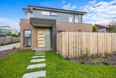1/9 Deschamps Street Lilydale VIC 3140 $700,000-$750,000 Nestled on a leafy street, this recently finished townhouse invites you into a sophisticated atmosphere blending opulent finishes and radiant surroundings. As you stroll on the rich floorboards, the bright neutral color scheme provides an ideal backdrop for any stylish decor. The open-plan living and dining areas, complemented by a deluxe stone-topped kitchen equipped with high-end appliances, seamlessly connect to a private courtyard garden for outdoor enjoyment. On the upper floor, the well-designed three-bedroom, two-bathroom layout features a central dual-vanity bathroom with a relaxing soaker tub. The master bedroom boasts a walk-in robe and an ensuite adorned with floor-to-ceiling tiles. Conveniently situated at the upper end of Lilydale Village, the property is within a leisurely walk to the train station, excellent dining options, abundant shopping, and Victoria Road Primary School. Key Features: Recently completed three-bedroom, two-bathroom townhouse Expansive open-plan living/dining area Stone kitchen with premium stainless steel appliances Spacious and secluded courtyard garden Master bedroom with walk-in robe and fully-tiled ensuite Central bathroom with dual vanity and a luxurious soaker tub Additional powder room Multiple split system air-conditioners Double automatic garage Proximity to Lilydale Village and the train station Walking distance to the primary school, cafes, restaurants, and shops Close to various top-tier secondary schools