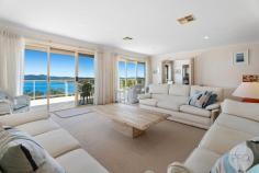 63 Scott Circuit Salamander Bay NSW 2317 Positioned in a peaceful street, this substantial brick residence epitomizes quality while boasting captivating water views that enchant from almost every angle. Meticulously designed to harness natural light, the home showcases expansive glass sliding doors that flood the interiors with sunshine, elegantly framing the serene water vistas and fostering a harmonious indoor-outdoor connection. Upon crossing the threshold, you are immediately welcomed into a grand loungeroom, exuding an atmosphere of sophistication and warmth. This inviting space seamlessly transitions to a sun-drenched balcony, creating a serene retreat for relaxation or upscale entertaining against the backdrop of mesmerizing water views. Adjacent to the loungeroom, the private dining area offers an intimate setting for gourmet meals and memorable gatherings. The heart of the home lies in its spacious kitchen, which is a culinary enthusiast's delight. Boasting ample cupboard and bench space, the kitchen is equipped to cater to both daily living and grand entertaining, ensuring every meal is a delightful experience. Descending to the lower level, a secondary living area awaits, characterized by a striking built-in bookcase that adds a touch of sophistication to the space. This versatile area serves as an ideal retreat for leisurely afternoons, family movie nights, or intimate gatherings with loved ones. The master suite is a haven of luxury and tranquility, featuring balcony access, a lavish ensuite bathroom adorned with water views, and an ambiance that invites relaxation and rejuvenation. The remaining 3 bedrooms or 2 bedrooms and study are generously proportioned, each thoughtfully designed with ducted air conditioning to ensure year-round comfort for all occupants. The home's main bathroom, while retaining its original charm, invites you to indulge in a spa-like experience, complete with elegant fixtures and finishes that enhance the sense of luxury. Outdoors, the fully retained backyard offers a private sanctuary for outdoor activities, gardening endeavors, or simply soaking up the sun in tranquil surroundings. Further complementing the home's appeal are modern conveniences such as ducted air conditioning for climate control, a double garage providing secure parking and storage, and solar panels contributing to energy efficiency and sustainable living. But wait, there is still more, on the lower level is an awesome space which would be used for a home office or a business ran from home with a sperate entrance (STCA), and there is the ideal "Man's Shed" that has been created under the house with ample area's for tool storage and workbenches. Ideally located within an approx a 900m radius of shops, sports ovals, cafes, restaurants, and the picturesque foreshore beach, this luxurious haven offers a perfect blend of convenience and coastal elegance.