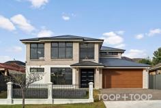 53 Rita Ave Rostrevor SA 5073 $1,800,000 Welcome to 53 Rita Avenue, Rostrevor, South Australia – where luxury meets functionality. This exquisite two-level home, constructed with solid brick walls, offers five spacious bedrooms, making it an ideal sanctuary for growing families or those who love to entertain. As you approach the property, the modern façade, featuring large double-glazed windows, hints at the sophistication within. Step inside and immediately, you’ll notice the seamless blend of contemporary design and practical living. The ground level opens up with a light-filled study, perfect for those who work from home. The expansive living area, adjacent to a sleek kitchen, is outfitted with Smeg appliances, a butler’s pantry, and plumbing to the fridge – catering to all culinary needs. Season the ambiance with the warmth of the Rhinai gas log fire heater in the living room, making it a cozy retreat on cooler nights. Adjacent to the living room, the elegant dining area flows effortlessly into the alfresco space, crafted for indoor-outdoor living. Imagine evenings spent entertaining guests or intimate family dinners with views overlooking North Adelaide and the CBD, right from your own backyard. The fully automated irrigation system ensures your lawns remain lush and green year-round, with minimal effort. Ascending to the first level, you’ll find a luxurious retreat and four additional bedrooms. The dual master ensuites across the two levels provide unparalleled comfort, with walk-in robes enhancing practicality. The upper-level living room boasts double-glazed windows, offering a serene space for relaxation or family bonding. This home is geared for the future with 3-phase power ready for rapid EV charging, and it ensures connectivity with NBN readiness. The Daikin semi-commercial reverse cycle air conditioning with a touchscreen zoning controller guarantees year-round comfort. Completing this immaculate property is the Gliderol panel lift garage door, ensuring your vehicles are secure and easily accessible. Enjoy the lifestyle on offer in this blue-chip Eastern locale, family friendly Rostrevor, a short drive to Newton Village Shopping Centre and Athelstone Shopping Centre, zoned to Stradbroke School and Morialta Secondary College, a short drive to popular Rostrevor College and St Ignatius College. Weekends will be spent exploring the leafy surrounds and backdrop of Morialta Conservation Park. Features of this resplendent home - Smeg appliances - Dual master ensuites across two levels - 3-phase power for rapid EV charging - Plumbing ready for the fridge - Double-glazed windows in the upstairs living room - Rinnai gas log fire heater - Automatic irrigation system - NBN ready - Gliderol panel lift garage door - Beautiful views overlooking North Adelaide and the CBD - Daikin semi-commercial reverse cycle air conditioning with touch screen zoning controller - Brick wall construction throughout both levels Whether you're seeking a residence in Rostrevor or an investment property with potential for generous returns and long-term tenancies, this home is poised to meet your needs.