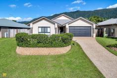 10 Norfolk Circuit Redlynch QLD 4870 $699,000 Your house hunting stops here …. Welcome to 10 Norfolk Circuit, Redlynch Therese Plath says "If you are looking for a private home that is loaded with features to move in ready, then look no further as this home will be sure to meet your requirement". This immaculately presented, low maintenance home is located in the highly sought after area of Redlynch, Cairns so close to all amenities including Redlynch Centre Shopping Centre, state and private schools and sporting nearby and approximately 12kms to Cairns City Centre. Nestled on a tranquil street, this single-level home sits on a gently elevated lot. Step inside to discover a welcoming atmosphere, accentuated by numerous windows that infuse the space with light and airiness, complemented by neutral tones. The generous, tropical open-plan design seamlessly expands the main living area through glass sliding doors, which open onto the spacious polished concrete alfresco dining and entertaining patio overlooking the fenced, safe backyard with a wonderful mountainous view. The functional kitchen is the hub of the home with breakfast bar, ceramic cook top and oven, new dishwasher, overhead cupboards, pantry and plenty of bench space. The master bedroom positioned for privacy at the rear of the home features a large walk in robe and en-suite which includes shower, single vanity and toilet, whilst the other three bedrooms with built in robes share the main bathroom with bath, shower and single vanity. Easy care gardening, this blank canvas awaits. Double gates allow easy access to the rear of the yard with ample space for swimming pool or shed and a safe haven for children and pets to play. Additional features include: Fully tiled throughout Fully air-conditioned and ceiling fans throughout Security screened to complete Vertical blinds Internal laundry Large linen cupboard Remote double garage with internal access Fenced at sides and rear with single and double gate side access to the front Approximate rental $ 700.00 to $730.00 per week, this home represents a prime opportunity for savvy investors or discerning homeowners