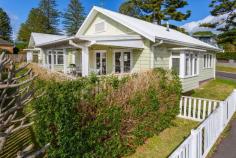 19A Bourrool Lane Kiama NSW 2533 This quintessential beach house is certainly one of a kind and offers stylish modern living while maintaining its relaxed coastal charm. Nestled just 130 metres from the pristine sands of Kiama's "Surf" Beach, this delightful cottage offers the perfect seaside escape. A short stroll will take you to the heart of town, with walking tracks, restaurants, cafes, schools, and the train station all within easy reach. Step onto the impressive covered front deck, the star of this stylish retreat. Here, you can entertain friends while enjoying elevated beach glimpses, refreshing ocean breezes, and views of the lush, easy-care gardens on the fenced, low-maintenance block. With DA approval for the addition of a second level, this charming cottage is ready for you to move in and make the most of its potential in this coveted beachside locale. Built to blend seamlessly with its original surroundings, this unique single-level home echoes a bygone era while offering all the modern conveniences of today. Simply put, this enchanting beach house is sure to captivate you and your loved ones, creating a world of wonderful memories for years to come.