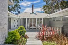 26 Koombala Grove Cordeaux Heights NSW 2526 $1,300,000 Built to make lasting memories, this 'happily ever after' family home will impress and inspire in equal measure. Providing a haven of comfort, this serene sanctuary features five generously proportioned bedrooms with built-in wardrobes, a tastefully renovated main bathroom with a strategically positioned skylight that allows natural light to shine through, a split-level entertaining area you'll gravitate to year-round and a bar that will surely be your go-to date night spot. The modern kitchen caters to culinary enthusiasts with its gas cooktop, ample bench space and a walk-in pantry where your organisational skills can truly shine. You'll need to see this property to appreciate its full potential with an impressive floor plan that maximises liveability, high ceilings, a cosy fireplace for added charm and warmth and a leafy outlook with escarpment views. Features - Tastefully renovated six bedroom family home plus a study - High ceilings, fireplace, leafy outlook, bar area - Main bedroom with balcony, ensuite with spa - Study to suit students or WFH professionals - Modern main bathroom with skylight feature, tub