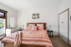 3 Neil Street Frankston South VIC 3199 $1,085,000 - $1,190,000 Sweetwater seclusion with beachside position Situated within one of Frankston South's most tightly-held pockets just steps from Sweetwater Creek and Frankston Beach, this spacious five bedroom residence provides an ambiance of coastal privacy. Reflecting its sensational beachside lifestyle with ample light and a low-maintenance ease, the modest design caters to the needs of young families, first-time buyers and investors alike with a perfect blend of comfort and endless future potential. Set wide across the block with still the ability for side vehicle access, the single-level home showcases a much-loved interior where a history of quality upkeep is evident across the zones. With two generous living spaces each featuring expansive windows, an open dining domain and a centralised kitchen with freestanding Technika cooker, dishwasher and island bench, its social hub provides comfortable family dynamics for both young and older families. Convenient deck access transitions from the secondary lounge, unveiling a generous outdoor dining space perfect for the warmer months. The elevated vantage point offers a sweeping view of the expansive rear yard; where established trees create a truly private sanctuary for little adventurers. Gas ducted heating and evaporative cooling keep the home comfortable across the seasons, while the clever layout sees all five bedrooms keeping the family close-by at night. Two main bathrooms, a powder room, open laundry space, under-deck storage, rear storage room, double carport and dual front gates all provide a comfortable living experience with potential for enhancement, while a FHSZ address only paces from Olivers Hill Boat Ramp, Little Olly's coffee and Frankston's major retail ensures a convenient coastal living experience.