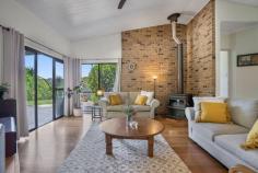 29 Durobby Drive Currumbin Valley QLD 4223 $2,250,000 With the promise of laid-back living in a secluded hinterland setting, this gorgeous property is your own tranquil slice of paradise. Set back from the road and presiding over more than 5000sqm of lush grounds abundant with a plethora of tropical fruit trees, this stunning family haven delivers a resort-style luxury lifestyle with all amenities close by. A soft natural palette combines with high ceilings and timber flooring throughout to create an inviting light filled ambience. The generous floorplan provides room for everyone, including a massive sunken living room with fire place for those cooler nights and the separate pool room, accessed via bifold doors, is an ideal party space. Cater for a crowd in the centrally located kitchen, well-appointed with 5 burner gas cooktop and electric oven, then head outdoors to an expansive covered patio, the perfect venue for grand scale celebrations. Spend time with the family, as you enjoy a refreshing dip in the shimmering pool, then laze the hours away on the deck amidst the lushness of the surrounding tree ferns, palms and gum trees. Four bedrooms and three bathrooms are also on the layout, the super-sized master suite with walk in robe and opulent ensuite, also has patio access and offers a serene sanctuary for rest and relaxation. Upstairs a kids retreat with two huge bedrooms, play area and bathroom allows for peaceful family life and a further bedroom on the lower level is serviced by the large main bathroom. Additional features include access to town water, Envirocycle system and a watertank for irrigation. There is also a 5Kw 20 panel solar system and the double garage and hardstand area provide room for all the vehicles. Idyllic living and superb convenience go hand in hand on the southern Gold Coast, where Currumbin Creek and Currumbin Alley are close by for stand-up paddle boarding and swimming and the Burleigh surf break is a short drive away. Multiple schools including Tallebudgera State School and St Augustine's Parish Primary are within a 10 minute drive and all your shopping needs can be met with Currumbin Fair Shopping Village and The Pines nearby. Property specifications Main features - Gorgeous acreage property nestled on over 5000sqm - High ceilings, timber floors and led lighting throughout - Four bedrooms and three bathrooms spanning two-levels - Huge sunken living room with fireplace and spacious dining, both with patio access - Modern kitchen with Caesarstone benchtops, gas cooktop, electric oven - Large pool room/2nd living area with built-in speakers - Huge outdoor living and resort-style pool with deck offers lush tropical outlook - Master suite with walk-in robe, ensuite with dual rainhead shower and patio access - Kids retreat with two bedrooms, play space and bathroom Other features - Double garage and hardstand for further vehicles - Tropical trees and plants including mango, citrus, avocado, ginger and macadamia - 5Kw 20 panel solar system - Access to town water and watertank for irrigation - Envirocycle Location - 10 minute drive to local schools - Retail options nearby at Currumbin Fair Shopping Village and The Pines - Short drive to Currumbin Creek and Currumbin Alley