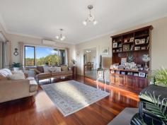 23 Powells Rd Foster VIC 3960 $1,185,000 Set on approx 1 ha of useable fenced land in the popular Golden Creek area at the base of the Hoddle range, just 8 mins from Foster, 10 mins from beautiful Waratah Bay beach, 15 mins to Wilson's prom gateway, this appealing property has been fastidiously maintained inside and out. Cleverly designed to maximise the outlook over the surrounding countryside and glimpses of Wilsons Prom. Offering the perfect alternative to a new build. Energy saving features include double glazing, solar power on a high feed in, zoned RC/AC for heating and cooling in living areas, office and main bedroom. Stunning polished jarrah flooring compliments the neutral décor and every living space opens out onto a deck - perfect for entertaining. Light filled living room with stylish Jotul wood heater. Superbly appointed central kitchen with rich timber cabinetry, stainless steel appliances and a large breakfast bar to the dining room. Master bedroom with WIR & ensuite bathroom plus a light filled home office/4th bedroom with perfectly placed picture windows. Upstairs to a spacious family room with raked ceilings, extensive glazing and balcony with pastoral views. Two further fitted bedrooms are serviced by a central family bathroom. The interior layout is ideal for accommodating a growing or extended family, or even to utilize part as a BnB. There are so many thoughtful inclusions - a large light filled laundry with stone bench, extra-large double garage with auto doors, storage area & direct access to the home. Additional garage/shed/workshop/studio with concrete floor, lights, power & water plus graveled parking area for a boat/caravan. Established vegetable beds & 60,000l of static water. Fenced paddock with room for a few sheep, alpacas or a pony. Sure to delight even the most fastidious buyer this is a property you will love to come home to.