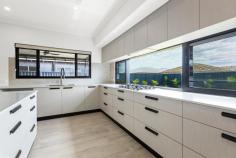 91 Tanami Drive Bilingurr WA 6725 $939,000 If you've been dreaming of building the ultimate luxury family home but don't want to wait for construction, here's one we prepared earlier. Built by Connolly Homes and never lived in, this stunning, brand-new family home redefines modern, luxury living in the Kimberley. And you'll soon discover why. Winner of the Master Builders WA Best Kimberley Country Home Builder award in 2023 and 2024, Connelly Homes has created a no-expense spared residence, delivering the highest quality of living throughout. From the Venetian render and feature splashback windows to the honed aggregate alfresco and custom cedar-look raked entryway, you'll notice superior, high-end finishes that you simply won't find anywhere else in Broome. It all starts from the front, with the home's stand out, eye-catching façade setting the standard for what is to come. Behind the electric gated entry, you'll find the large double carport with secure parking for two vehicles and plenty of additional driveway parking available. You enter the home via the beautiful raised concrete portico with feature render and stunning raked pine ceiling. Inside is nothing short of spectacular. The interior boasts spacious open-plan living and dining with feature wood flooring, high ceilings, and abundant natural light thanks to the feature splashback windows. At the heart of the home is the modern Chef's kitchen complete with huge scullery, stainless steel appliances (all under warranty), stone benchtops, feature hanging lights, soft-close drawers, near endless cupboards and drawers and a big island breakfast bar. With a meticulously well-thought-out floorplan, the entry drop zone with bench seating and study desk offers functionality, as does the laundry location, with access to the rear from the scullery and plenty of built in cabinetry. Every detail has been carefully considered in both of the stunning bathrooms, with the main bathroom boasting a hob-less shower, invisible drainage and a freestanding bath. The home itself boasts 4 big bedrooms, all with built-in robes and air-con, including the spacious and stylish Master suite, complete with walk-in his and hers robes, louvre windows and a massive private ensuite, carrying through the feature Venetian rendering and stylish tiling, offering built in shower shelving. Beautifully crafted inside and out, the honed aggerate alfresco with three ceiling fans, is purpose-built for entertaining, overlooking the expansive rear yard with plenty of lush green grass for the kids and pets to play. There's a stunning Mandi toilet with, a big lock-up workshop/shed for all your tools and toys, and more than enough room to sink a large pool if you desire. Located within walking distance to a number of local parks with fantastic playground equipment, and close to the new Broome North Primary School and Cable Beach, it's the vibrant, community style living you've been searching for in a truly stunning home.