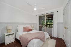 159B Lindsay Road Buderim QLD 4556 If you love homes brimming with character and privacy, this charming timber home in Buderim should be at the top of your must-see list. Nestled on a lush 1296m² block within walking distance to village amenities, this property offers a unique blend of convenience and tranquillity. This appealing home boasts five bedrooms, two bathrooms, open-plan living and dining areas, a new modern kitchen, and a covered rear timber deck with a bushland outlook. Additional highlights include a double carport with a workshop/storage and loft, plus ample on-site parking for a boat or Caravan. Noteworthy features include a beautiful brand new modern kitchen with 20mm stone benchtops, a large 90cm gas cooktop, stainless steel appliances, a fireplace in the lounge, high ceilings with a huge skylight over the kitchen bench, freshly polished hardwood timber floors, ceiling fans, freshly painted interior with original wainscoting, direct deck access from two of the bedrooms, and generous storage space. The covered deck is the perfect spot to unwind, whether you're sipping your morning coffee to the sound of birdsong or relaxing with a glass of fine Australian wine after a long day. The gently sloping but fully usable block backs onto a forest, creating a serene and private sanctuary-like atmosphere. There is plenty of room for a pool in either the front or back yard, making this a premium home with versatile options to suit everyone. Located just minutes from Buderim Mountain Primary School, the Post Office, and other village amenities, and less than 10 minutes from Maroochydore and Mooloolaba, this prime location in Buderim is one of the Coast's most sought-after suburbs. Buderim, QLD 4556, is a picturesque town situated on the Sunshine Coast. Known for its elevated position atop Buderim Mountain, the town offers stunning views of the surrounding area, including the coastline and hinterland. Buderim is renowned for its lush greenery, beautiful gardens, and strong sense of community. The town features a mix of charming heritage buildings and modern amenities, making it an attractive place to live. Residents enjoy a relaxed lifestyle with easy access to parks, walking trails, cafes, shops, and excellent schools. Its proximity to beaches, major shopping centres, and healthcare facilities adds to its appeal.