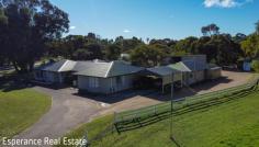 1 Frank Freeman Drive Bandy Creek WA 6450 $1,200,000 This listing offers the best of both worlds – expansive rural living with the convenience of being close to town and on town scheme water. Whether you’re a horse enthusiast or simply seeking space, this home has it all. Welcome to 1 Frank Freeman Drive in Bandy Creek. Located at the gateway to the Racecourse Estate on an easy maintenance 8005sqm lot, this property contains all the specs for a modernised large family home while still allowing the pleasures of enjoying life. The rendered brick and colorbond main residence contains four large bedrooms, all with robe space, and the two bathrooms as you could expect from a family property of this magnitude. Outdoor entertaining is a treat all year around with the huge gable roof alfresco area with all inclusive patio blinds, verandahs and courtyard. An adjacent fully refurbished and self-contained 2 bedroom ancillary accommodation, also with new roofing and its own hot water system, provides space for visiting family and friends or an additional income should you choose to let out. From the three-road access, you will also love the massive 15m x 9m powered shed and workshop with the 5m high opening door suitable for all caravans or recreational fishing boats being within only 2.2km’s to the Bandy Creek Boat Ramp and Deep Sea Angling Club. and it wouldn’t be the Racecourse Estate without catering to the horses! If it were your own or even let out to local horse owners, the plentiful surrounding fenced grounds contributes to any horses needs with three brick stables with power and water as well as a tackroom. This property has been lovingly maintained over the years and now is time to make new memories for the successful purchaser.