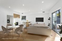 9/18 Phillips Avenue West Wollongong NSW 2500 $895,000 Embrace a carefree, suburban lifestyle with these meticulously crafted town homes located in the heart of Wollongong. A great place to put down roots, each offering three well-proportioned bedrooms including a spacious main with walk-in wardrobe, a tastefully-designed kitchen with stone benchtops, lock-up garage and a peaceful courtyard, where you can enjoy a morning cuppa or simply take a well-deserved time out from the hustle and bustle of the day. Providing a neutral canvas for you to make the space your own, this light-filled residence offers families of all ages and stages the opportunity to be the first to call this delightful town house a home. Features • High ceilings throughout main living areas • Ducted reverse-cycle A/C upstairs and down • two bathrooms, 1 downstairs and 1 upstairs • Large bedrooms with built in robes • Second sitting room upstairs, under stair storage • Situated in a lush cul-de-sac, moments to the CBD