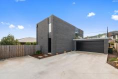 4/8 Alexias Way Oakdowns TAS 7019 $670,000 Constructed in 2021 by one of Hobart's premium builders, Elevate Building Tasmania, widely known within the construction industry for their exceptional build quality and impressive finishes, this stunning 3 bedroom, 2 bathroom home is sure to impress. Upstairs is home to a beautiful open plan living and dining area with timber floors and inviting neutral and modern décor, bathed in light and warmth. The beautiful kitchen comprises stone benchtops, soft-close drawers, and a hidden butler's pantry. This area creates a smooth connection between indoor and outdoor entertaining by providing access to the spacious deck, perfect for summertime and entertaining for friends and family. A privately tucked away powder room is also placed upstairs for added convenience. All three bedrooms are located downstairs, with the master bedroom including an ensuite, built-in wardrobes, and access to the backyard. The property boasts two further ample-size bedrooms also with built-in wardrobes. The main bathroom features an integrated bath and separate shower with attractive terrazzo tiles as well as matte black tapware and floating vanity. Downstairs also comprises a European laundry and internal access to the secure, two car garage. The backyard is low maintenance and fully fenced but still has plenty of space for the avid green thumb or for pets and children. Situated in Oakdowns, which is only a 20 minute drive to the Hobart CBD and close to the new Glebe Hill Shopping Village. This includes all your local services and amenities, including a supermarket, post office, pharmacy, and more.