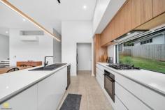 224 Wiseman Road West Edmonton QLD 4869 $719,000 Welcome to 224 Wiseman Road West, Edmonton-a stunning residence set on a low-maintenance 1,151m² block, home is just 20 minutes from Cairns and a short drive to schools, shopping, and transport. Therese Plath proudly presents this executive-quality home, thoughtfully designed and masterfully built to feature a family-friendly floor plan with an open layout, perfect for entertaining both indoors and out. The clever layout of this home maximizes space, creating a bright and airy atmosphere that redefines modern executive living. This light-filled home, with its soaring cathedral ceilings in the living area, is designed to embrace an indoor-outdoor lifestyle, making the most of our tropical climate. The alfresco patio offers a tranquil view of the surrounding mountains and enjoys refreshing breezes, creating the perfect backdrop for relaxation. Situated in a highly sought-after area, this four-bedroom designer home seamlessly blends modern features with practicality, creating an inviting and open atmosphere from the moment you enter through the double front doors. Every inch of the home is adorned with stylish tiles, ensuring a smooth flow throughout the living spaces. The contemporary design elements further enhance its aesthetic appeal, making this residence truly exceptional. At the centre of this home is a stunning galley kitchen, meticulously designed with premium finishes. This culinary space marries form and function beautifully, with sleek cabinetry, a spacious walk-in pantry, top-of-the-line appliances, and generous counter space-perfect for both everyday cooking and gourmet meal preparation. The master bedroom serves as a private retreat, featuring a spacious en-suite and a walk-in robe. The bathrooms throughout the home reflect tasteful design and meticulous craftsmanship, providing spa-like sanctuaries. This residence epitomizes a well-balanced lifestyle, with wide side access and ample room for a shed, swimming pool, or both. Indulge in modern living with a harmonious blend of luxury, style, and comfort. If this property is already ticking your boxes, now is the time to turn your dream into reality.