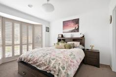 5 Allington Place Langwarrin VIC 3910 $749,000 - $799,000 Holding a privileged address within one of Langwarrin's most convenient enclaves, this beautifully enhanced home delivers instant appeal for modern families or retirees seeking a hassle-free lifestyle in the heart of Langwarrin. Brimming with space and seclusion, the three-bedroom home artfully blends modern updates with thoughtful inclusions to create an inviting setting across two distinct living zones, open dining space and an almost-new kitchen. Making entertaining on a large scale an easy task, the culinary domain features a large walk-in pantry, Westinghouse pyrolytic oven, a 900mm gas cooktop, soft-close cabinetry and stone waterfall benchtops. A fluid indoor-outdoor design promises perfect all-season space, as a large covered alfresco links with a protected above-ground spa, and a rear yard with a fire pit and garden shed. The three-bedroom 2-bathroom floorplan keeps kids together within a private wing alongside the main bathroom with separate toilet, while the master bedroom with walk-in robe and dual-vanity ensuite provides parents with their own privacy. A solid wood heater brings a natural warmth across the rear entertaining footprint, while split-system heating and cooling and gas ducted heating offer push-button convenience. Complete with plantation shutters, ceiling fans, a fully-lined single garage with internal access and a rear storage room, a 6.5kW solar system and ample off-street parking inclusive of separate caravan/boat storage. A convenient position only paces from Langwarrin Plaza, Woodlands Primary School and public transport sees Langwarrin's amenity-rich landscape remain within easy reach.