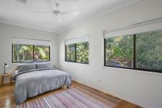 29 Durobby Drive Currumbin Valley QLD 4223 $2,250,000 With the promise of laid-back living in a secluded hinterland setting, this gorgeous property is your own tranquil slice of paradise. Set back from the road and presiding over more than 5000sqm of lush grounds abundant with a plethora of tropical fruit trees, this stunning family haven delivers a resort-style luxury lifestyle with all amenities close by. A soft natural palette combines with high ceilings and timber flooring throughout to create an inviting light filled ambience. The generous floorplan provides room for everyone, including a massive sunken living room with fire place for those cooler nights and the separate pool room, accessed via bifold doors, is an ideal party space. Cater for a crowd in the centrally located kitchen, well-appointed with 5 burner gas cooktop and electric oven, then head outdoors to an expansive covered patio, the perfect venue for grand scale celebrations. Spend time with the family, as you enjoy a refreshing dip in the shimmering pool, then laze the hours away on the deck amidst the lushness of the surrounding tree ferns, palms and gum trees. Four bedrooms and three bathrooms are also on the layout, the super-sized master suite with walk in robe and opulent ensuite, also has patio access and offers a serene sanctuary for rest and relaxation. Upstairs a kids retreat with two huge bedrooms, play area and bathroom allows for peaceful family life and a further bedroom on the lower level is serviced by the large main bathroom. Additional features include access to town water, Envirocycle system and a watertank for irrigation. There is also a 5Kw 20 panel solar system and the double garage and hardstand area provide room for all the vehicles. Idyllic living and superb convenience go hand in hand on the southern Gold Coast, where Currumbin Creek and Currumbin Alley are close by for stand-up paddle boarding and swimming and the Burleigh surf break is a short drive away. Multiple schools including Tallebudgera State School and St Augustine's Parish Primary are within a 10 minute drive and all your shopping needs can be met with Currumbin Fair Shopping Village and The Pines nearby. Property specifications Main features - Gorgeous acreage property nestled on over 5000sqm - High ceilings, timber floors and led lighting throughout - Four bedrooms and three bathrooms spanning two-levels - Huge sunken living room with fireplace and spacious dining, both with patio access - Modern kitchen with Caesarstone benchtops, gas cooktop, electric oven - Large pool room/2nd living area with built-in speakers - Huge outdoor living and resort-style pool with deck offers lush tropical outlook - Master suite with walk-in robe, ensuite with dual rainhead shower and patio access - Kids retreat with two bedrooms, play space and bathroom Other features - Double garage and hardstand for further vehicles - Tropical trees and plants including mango, citrus, avocado, ginger and macadamia - 5Kw 20 panel solar system - Access to town water and watertank for irrigation - Envirocycle Location - 10 minute drive to local schools - Retail options nearby at Currumbin Fair Shopping Village and The Pines - Short drive to Currumbin Creek and Currumbin Alley