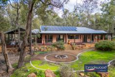 385 Mueller Pl Hovea WA 6071 $1,100,000Escape to tranquillity in this exquisite 4-bedroom, 2-bathroom plus study home in the heart of Hovea, Perth Hills. Nestled high on 2.47 acres overlooking the beautiful Hovea Valley and nearby John Forrest National Park, this is a nature lover’s dream! Built in 2001 by Rural Building Co, this property offers an unparalleled lifestyle where nature’s beauty meets modern hills living. 4 bedrooms, 2 bathrooms + study Soaring ceilings, timber features 2001 build by Rural Building Co Amazing timber deck/entertaining area Colorbond Workshop Open-plan kitchen, living and dining area Duct rev/cycle a/conditioner plus S/system 1 hectare of pristine bushland House located on a quiet no-through road 35-minute drive to Perth City A spacious living area with high ceilings and an open-plan design sets the tone for this modern home. The living and dining areas flow seamlessly, creating a perfect space for family gatherings and entertaining. The house is equipped with a split system and reverse cycle air conditioner, ensuring comfort year-round. Step onto the expansive outdoor deck, a perfect haven for entertaining and relaxation. This beautifully designed space offers ample room for alfresco dining, lounging and hosting gatherings with family and friends. Surrounded by greenery and overlooking the serene landscape, the deck seamlessly blends the comfort of home with the tranquillity of nature. Whether you’re enjoying a quiet morning coffee, a lively BBQ or an evening under the stars – this outdoor feature enhances your lifestyle with its charm and versatility. Discover a sprawling backyard that blends effortlessly into its surroundings. With 1 hectare of land, there’s plenty of room for outdoor activities, gardening or simply enjoying the serenity of nature. The property offers beautiful wildlife and scenic beauty. Despite its serene setting, the property is only a 35-minute drive from Perth City, offering the perfect balance between peaceful country living and urban convenience. Wake up to the sound of native birds and the rustling of gum trees. The green landscape provides a calming backdrop, ideal for those seeking a retreat from the hustle and bustle of city life. Hovea is known for its close-knit community and relaxed lifestyle. Enjoy the benefits of country living – every window in the house frames a picturesque view of the natural landscape, with majestic gum trees and the soothing sounds of native wildlife providing a scenic backdrop.