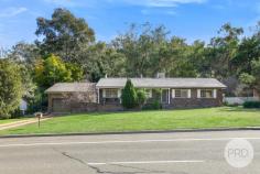 86 Daruka Road tamworth NSW 2340 Quality home on a great sized block in a superb location, that's what you'll find at 86 Daruka Road, Tamworth. This stunning brick home has enough room for the whole family with four bedrooms, two living areas, and a great sized dining space. It's the home that just keeps going with eye catching polished wooden floorboards throughout, a split system installed in the main living room and additional evaporative cooling installed for added comfort in summer. For winter you have two wood fires installed, one in the dining area and a separate one in the second living space. As you make your way outside prepare to be taken back by the tranquility and peaceful aura the backyard provides you. With established trees surrounding and plenty of room to relax this is the perfect place to raise a family. This magnificent home will not be on the market long so get in quick and inspect today!