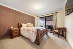 11 Toni Court Darling Heights QLD 4350 $739,000 Be the first to see this stunning family home in one of Toowoomba's best residential pockets. This home sits in a quiet cul-de-sac court and is adjacent from family friendly parkland and is walking distance to schools, 7-Eleven, hardware store and is just minutes to major shopping centres and outlets. This home is a must to see with stunning street appeal in an excellent and prime location. From entry you'll be greeted with a large open plan family dining and kitchen area and all year round comfort from the reverse cycle. Air conditioning and gas heater points. Low job bench cupboards and pantry space for your convenience, gas cooktop, electric oven, dishwasher and ideal breakfast bar awaits. Three generous built-in bedrooms with the main bedroom featuring ensuite, walk in robe, sliding door access to the deck and mounted TV. Double garage has been professionally converted into a large family room/4th bedroom. Low maintenance rear yard has no mowing and offers 6m x 4m shed/workshop, fire pit and 2x2000lt rainwater tanks. Entertaining family and friends has never look so good, dance the night away on the timber deck overlooking the cozy wood fire pit. Beat rising energy costs with a 22 panel solar system and a massive 5kW inverter.