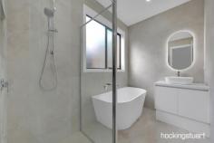 14 Mulholland St Kalkallo VIC 3064 $660,000 - $685,000 This brand new home offers a great open-plan layout partnered with timeless design. Adding a touch of luxury to everyday living, this home features multiple living areas with four bedrooms with a master and its ensuite. Together with a stylish kitchen, a large walk-in pantry and an expansive laundry this is one functional floorplan. Kitchen is equipped with stainless steel appliances and dishwasher. Stand Out Features: • High Ceiling • Formal Living Area • Stone benchtops to kitchen with waterfall. • LED downlights to all areas • 900mm appliances • Dishwasher • Quality tapware • Walk in Pantry • Expansive laundry • Quality Window Furnishings • Spacious Master with ensuite • Ensuite with double vanity • Floor to ceiling tiles in bathrooms with stone countertops. • Decorative Lighting