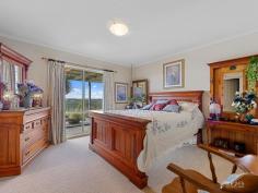 305 One Chain Road Kardella VIC 3951 $1,135,000 Situated on 2 acres, overlooking expansive grazing properties with uninterrupted panoramic water views across the Western Reservoir, the green hills of the Strzelecki ranges and beyond towards the coast and Wilsons Promontory. This generous brick veneer family home with such commanding views could be your ideal lifestyle property. The home features: - North facing kitchen, dining, and living with view capturing windows. - The kitchen has generous bench space with gas cook top, electric oven, dishwasher and walk in pantry. - From tiles to the carpeted living space with reverse cycle air conditioner and cast-iron wood heater for those winter days. - A study nook off the living space is ideal for small home office. - Decked veranda expands out three sides to capture the views creating a spacious north facing entertaining area. - Five bedrooms all with built in robes, currently utilised inclusive of parents retreat and study, with the master complete with ensuite and walk in robe. - Family bathroom with double vanity, shower, spa bath and separate toilet - Separate laundry in addition to 2 car garage providing direct hallway access inside. - High ceilings throughout, all new recent updates with painting and carpets Externally: - Set on 2 acres (approx.) on a gentle rise and sheltered from the southwest. - 3 well fenced paddocks, ideal for a pony, sheep, or let the neighbours cows in! - Ample workspace and storage in the impressive shed 12m x 12m barn, fully concreted with power. - 90,000 L water tank storage providing ample water for residence and property. - Superb solar system, comprising (34 Panels) with solar hot water/electric back up. - Surrounding the home is a gorgeous low maintenance garden with a delightful pond courtyard soaking in the north sun and views. Located 7 mins to Korumburra, 15 mins to Leongatha, 30 mins. to Inverloch, 40 mins to Warragul and 90 mins to Melbourne. And for those that love to walk, run, or ride a bike, just a couple of minutes down the road in beautiful Kardella you have access directly onto the Great Southern Rail Trail! It is a credit to our vendor for the love they have bought to this property, and now it is time for a new custodian to enjoy the garden, birds, and magnificent views.