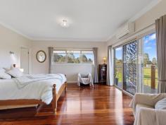 23 Powells Rd Foster VIC 3960 $1,185,000 Set on approx 1 ha of useable fenced land in the popular Golden Creek area at the base of the Hoddle range, just 8 mins from Foster, 10 mins from beautiful Waratah Bay beach, 15 mins to Wilson's prom gateway, this appealing property has been fastidiously maintained inside and out. Cleverly designed to maximise the outlook over the surrounding countryside and glimpses of Wilsons Prom. Offering the perfect alternative to a new build. Energy saving features include double glazing, solar power on a high feed in, zoned RC/AC for heating and cooling in living areas, office and main bedroom. Stunning polished jarrah flooring compliments the neutral décor and every living space opens out onto a deck - perfect for entertaining. Light filled living room with stylish Jotul wood heater. Superbly appointed central kitchen with rich timber cabinetry, stainless steel appliances and a large breakfast bar to the dining room. Master bedroom with WIR & ensuite bathroom plus a light filled home office/4th bedroom with perfectly placed picture windows. Upstairs to a spacious family room with raked ceilings, extensive glazing and balcony with pastoral views. Two further fitted bedrooms are serviced by a central family bathroom. The interior layout is ideal for accommodating a growing or extended family, or even to utilize part as a BnB. There are so many thoughtful inclusions - a large light filled laundry with stone bench, extra-large double garage with auto doors, storage area & direct access to the home. Additional garage/shed/workshop/studio with concrete floor, lights, power & water plus graveled parking area for a boat/caravan. Established vegetable beds & 60,000l of static water. Fenced paddock with room for a few sheep, alpacas or a pony. Sure to delight even the most fastidious buyer this is a property you will love to come home to.