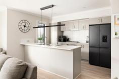3 Bookleaf Road Botanic Ridge VIC 3977 $600,000 - $639,000 Showcasing a harmonious blend of contemporary design and modern convenience, this three-bedroom townhouse is ideally located just blocks from Botanic Ridge Primary School and Homestead Park. It provides couples and young families with a seamless living experience that embraces a leisure-focused lifestyle without the upkeep. Low-maintenance gardens accentuate a contemporary exterior, while inside features a welcoming ground-floor social domain and a private first-floor accommodation zone, ensuring the perfect balance of privacy and connectivity for young families. Both open and airy, the rear social domain fosters family connection within the living and dining areas, integrating seamlessly with a sun-drenched patio and a stone-finished kitchen comprising sleek stone benchtops, gas cooktop and underbench oven, and direct laundry access with private powder room. Keeping privacy at the forefront with plantation shutters across all first-floor bedrooms, the accommodation comprises three bedrooms including the master with ensuite and walk-in robe, and a main bathroom with oversized shower and single vanity with under bench storage. With split-system heating and cooling, discrete storage throughout, rear water tank, an outdoor roller blind and a double garage with internal access, this impressive two-storey home delivers an appealing residential proposition in the heart of Botanic Ridge, moments from Botanic Ridge Village, Bluebird Early Education, and public transport.