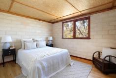 154 Victoria Street Mount Victoria NSW 2786 $1,100,000 - $1,200,000 Offering plenty of space for a growing family, this rustic architecturally designed family home has earthy tones and textures. Surrounded by native bushland, it boasts elevated views across the distant valley. The overall floorplan is expansive and flexible. The main house, with a high quality wheelchair lift, is truly a unique find. It has 3 bedrooms, open plan living, kitchen and dining, home office, plus an internal laundry. The lower level main house has a large bedroom, living area, shower with laundry facilities and a stylish kitchenette. For those requiring additional blended family living space there is a self-contained 1 bedroom studio with its own storage capacity too. Breakdown of Features: Main House Upper Level • Excellent floor plan affording flexible living options; wheelchair accessible • Open plan living area opening onto full width entertaining deck to rear • Three well proportioned bedrooms with ample space for storage; home office/study room • Gas cooktop kitchen with slimline dishwasher; s/c wood fire and reverse cycle a/c wall unit • Int. laundry with ample storage and ext. access to deck; 6.6kw solar panels Main House Lower Level • Well proportioned living area and queen bedroom; reverse cycle a/c wall unit • Spacious shower bathroom with laundry; separate galley-style kitchenette Self-Contained Studio • Living area with kitchenette, shower room and One bedroom • Expansive approximate 1,751sqm native block with valley outlook • 1.3km drive to city train links, iconic cinema, cafes and the V&A restaurant