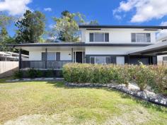 1 Bligh Court MOUNT PLEASANT QLD 4740 Located in a serene cul-de-sac within the coveted Mount Pleasant neighbourhood, 1 Bligh Court presents an exceptional opportunity for families and investors alike. This elevated two-storey, split-level abode has been meticulously renovated to combine modern living with classic charm. Upon approach, the home invites you in with its welcoming front verandah. Step inside to discover a bright and airy living space, anchored by a brand-new kitchen, complete with sleek finishes and view to the shady backyard. The kitchen, dining, and living areas are comfortably air-conditioned, ensuring year-round comfort. The residence offers four generously sized bedrooms upstairs, alongside a newly fitted family bathroom, while beautiful timber floors add warmth and character throughout. For additional versatility, the large and air-conditioned second living space downstairs could serve as a fifth bedroom, media room, rumpus, or an ideal home office/business hub, with the convenience of its own separate entrance. Outside, the expansive back patio is perfect for entertaining or quiet family evenings, overlooking the additional large concreted area and an 800m2 block that boasts space for a potential shed or swimming pool. Additionally, side access further enhances the functionality of this impressive property. Parking is well-catered for with a single garage featuring a workshop area, as well as a single carport. The entire home has been freshly painted inside and out, and the property is situated in a peaceful no-through road cul-de-sac. With a desirable and elevated easterly aspect, you'll enjoy terrific views and breezes, while being conveniently located across from Mount Pleasant Shopping Centre. Families will appreciate the proximity to local schools and the Mackay CBD, making 1 Bligh Court a truly desirable address for a discerning buyer.