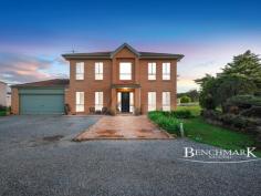 117 Eagleview Rd Minto NSW 2566 Discover a rare gem in Minto's prestigious acreage section, where grand-scale family living meets unparalleled luxury. This extraordinary residence offers a lifestyle of comfort and sophistication, perfect for those seeking both relaxation and entertainment. Key Features: * Expansive Living Spaces: Experience the grandeur of four generously sized bedrooms, each with built-in robes. The master suite is a retreat unto itself, featuring a spacious sitting area, walk-in robe, and a lavish ensuite with dual basins and a deep freestanding tub. * Versatile Workspaces: Ideal for professionals, the home includes a dedicated home office or potential fifth bedroom, plus a massive workshop equipped with 3-phase power. * Modern Comforts: Enjoy year-round comfort with ducted air conditioning, split system units, and ceiling fans throughout. The 2.7-meter high ceilings add to the sense of space and luxury. * Gourmet Kitchen: The chef's kitchen boasts 40mm Caesarstone benchtops with waterfall edges, twin ovens, gas cooking, stainless steel appliances including a dishwasher, a walk-in pantry, and a breakfast bar overlooking the meals area. * Entertainment Paradise: Summer will be a delight with multiple outdoor entertaining areas, including a resort-style inground swimming pool with an in-pool bar and stools. Unwind in the sunken pool cabana or enjoy the serene gazebo by your own dam. An outdoor kitchen with built-in BBQ, pizza oven, fridge, sink, and cupboards completes the alfresco experience. * Convenient Amenities: The home also features a bright main bathroom, powder room, laundry with linen closet and backyard access, and a ducted vacuum system. A poolside bathroom with a separate toilet adds extra convenience. * Additional Luxuries: Benefit from a 13.2 kW solar panel system, fully operating security camera system, manicured gardens with a charming gazebo, and a double garage with remote access and backyard entry. Location: Set in a family-friendly neighborhood, this property combines the tranquility of a semi-rural setting with the convenience of urban amenities. Enjoy proximity to Minto Marketplace (a 12-minute walk), local schools, Minto Train Station, sports complexes, parks, and more. This magnificent home is a must-see for those looking to elevate their lifestyle.