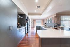 8 Fullman Turn Baldivis WA 6171 $775,000 Nestled in the heart of Settlers Hills Estate, this quality 2005 Dale Alcock home exudes craftsmanship and attention to detail. Featuring stunning solid Jarrah flooring, high ceilings, and an impressive enclosed theatre room with recessed ceilings, this residence is designed for both style and functionality. The spacious open-plan living area flows seamlessly to a double-sized alfresco, complete with cafe blinds, perfect for year-round entertaining. The powered workshop, lush gardens, and 5kW solar panels add practicality and sustainability to this beautiful property. • High ceilings and solid Jarrah floors • Ducted air conditioning throughout • Well-equipped kitchen with stainless steel appliances, dishwasher, breakfast bar, ample bench space and shoppers' entry • Dedicated study could be utilised as a 5th bedroom if required • King-size master suite with built-in robes and an ensuite with twin sink vanity, shower and separate WC • Double-sized minor bedrooms with built-in robes • Large alfresco with ceiling fan, down lights and cafe blinds • Good size backyard with a 5m x 3m powered workshop • 5kW solar panels and an instant gas boost hot water system • Short walk to Settlers Primary School and Tranby College
