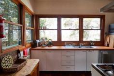 223 Hat Hill Road Blackheath NSW 2785 $875,000 - $925,000 Step back in time and immerse yourself in the enchanting charm of this lovingly restored 1930s cottage. Nestled against the serene backdrop of the national park, it boasts stunning vistas across the Grose Valley. Known as 'The Artist's Cottage', this hidden gem offers a unique blend of vintage character and modern comfort, making it the perfect sanctuary for nature lovers, artists, and anyone seeking a peaceful escape. Breakdown of Features: Two cosy bedrooms feature generous WIRs, providing comfort and plenty of storage Abundance of natural light flows through open-plan living, kitchen and dining areas Beautiful rendered chimney housing a fan-assisted slow combustion wood fire Functional country-style kitchen; large gas stove, quality fixtures and finishes Studio situated at rear of property with a multitude of uses Stunning gardens featuring a variety of native and exotic plantings; wide array of nooks and 'special hideaways' scattered throughout the gardens Filtered vistas out over the Grose Valley 2.4km walk/drive to village; close proximity to bush walks and lookouts