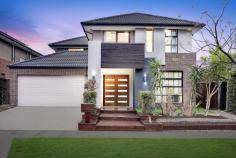 12 Trenchard Rd Williams Landing VIC 3027 Seize the chance to own a truly stunning home in the prestigious Williams Landing, where quality and modern living converge. This meticulously designed CARLISLE residence, located in a tranquil and sought-after neighborhood, boasts premium designer features and the finest quality fixtures and fittings throughout. From the moment you step through the grand entrance, this home will captivate you with its elegance and spaciousness, offering an unparalleled lifestyle. Downstairs: # Four expansive living areas, providing both formal and informal spaces for every occasion. # Generous study/office area at the entrance, perfect for those who work from home. # A formal lounge room and a dedicated theatre room, accompanied by a convenient powder room. # The Master Chef kitchen, complete with a walk-in pantry, abundant storage, expansive stone benchtops, a freestanding 900mm gas cooktop and oven, glass canopy rangehood, and a dishwasher overlooking the meals and family area. # Separate laundry room with storage cupboards, a linen room, and external access. # Fully decked entrance and an undercover alfresco area for seamless indoor-outdoor entertaining. # Remote-controlled double car garage with internal and external access. # Low-maintenance, spacious front and backyards. Upstairs: # Spacious family retreat area with custom-built study table and shelving. # A lavish master bedroom featuring a walk-in robe with mirrored sliding doors, a full en-suite with double vanity, separate toilet, and a private balcony. # Three additional bedrooms, each with built-in robes. # Large central bathroom and separate toilet. # Convenient linen room. Additional Highlights: Double door entrance, high ceilings, quality flooring and carpets with upgraded underlay, evaporative cooling and ducted heating, stone benchtops, upgraded tapware, glass splashback, wine rack, soft-close toilet seats, LED downlights, tiled shower bases, extended eaves, gas-boosted solar hot water system, oversized bathroom mirrors, security alarm system, sink and water connection in the alfresco area, garden beds, flyscreens, bidet toilet seats, quality light fittings, and blinds throughout. Perfectly positioned close to Williams Landing Shopping Centre, Williams Landing Train Station, Williams Landing Town Centre, Westbourne Grammar School, childcare centres, wetlands, parklands, public transport, and with easy freeway access, this home provides an exceptional lifestyle.