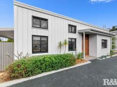 23A Telopea St Booker Bay NSW 2257 $1,450,000 Welcome to 23a Telopea Street, Booker Bay this front villa of two is truly unique in design and extraordinary in finishes. You will be impressed by the space, natural light, construction and quality finishes the moment you enter the oversized New Guinea Rosewood pivot front door. The villa features include: - Three bedrooms all with full ceiling height robes, NBN Ports and ceiling fans the main with ensuite bathroom - A designer contemporary kitchen with extraordinary, cantilevered polished concrete island bench, Fisher Paykel appliances, custom storage cabinetry, stacker servery window to the entertainment space and island bench - Two designer bathrooms with quality fittings and fixtures, timeless in design and colour palate and floating wall mounted vanities - Polished concrete floors throughout the living spaces exudes an elegance rarely seen in villa's today. The floors are complimented by the polished internal concrete walls and the ceilings that are raked to a height of approximately 4 meters that accentuate size, space and light - Internal laundry with custom cabinetry - Additional features include ducted air conditioning throughout for heating and cooling, solar panels, louvred windows, networking switchboard with FTA, Data, phone and audio cabling installed. - The courtyard is low maintenance and flows seamlessly from the alfresco area - A large single garage has automatic door and internal access Well, what about the location you are positioned a level walk to cafes, restaurants, palm beach ferry, local theatre and the Ettalong Beach town centre and beachfront.