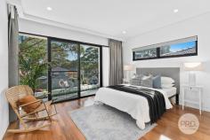 122A Park Road Hurstville NSW 2220 A superb statement in modern design, this quality style double brick residence has been beautifully crafted throughout to deliver a state-of-the-art high spec living space at its ultra-contemporary best. Impressively proportioned, supremely stylish and embracing a range of premium finishes, it delivers a spacious living environment and makes a stunning home for the entertainer with its flowing indoor-outdoor layout and a generous 412.50sqm approx. level block of land. From this quiet end of Park Road, you're also less than 600m from the heart of Hurstville with a range of shopping, dining out and transport options within close range. *Supremely spacious layout showcasing two levels of high-quality finishes *Sun-filled interiors feature an open plan living space that leads outdoors *Chef's island kitchen with stone benches and premium Miele appliances *Five bedrooms include two upstairs masters with walk-ins, ensuites and balconies plus study area *A third master suite downstairs with built-in robe and ensuite and formal lounge room *A total of five bathrooms including three ensuites and two deluxe mains *An enclosed entertainment patio with outdoor kitchen and dining area *Private and sunny backyard with level lawn in peaceful leafy surrounds *A separate full brick family retreat complete with kitchenette and bathroom *Auto garage and storage with internal access plus extra driveway parking *Smart home system with lighting control, ducted air, intercom and CCTV security *Cleverly designed to take full advantage of light, airflow and space *Solid timber and soaring ceiling throughout *A stone's throw from Danebank Anglican Girls