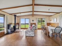285 Falls Rd Stony Creek VIC 3957 $770,000 Set on approximately 1.2 hectares of fenced land, sited to capture expansive views over the surrounding countryside and the picturesque valley setting. Cedar ranch style home with decks on each side, offering a sheltered space to sit and enjoy the outlook. Open plan living room with exposed beams and raked ceiling, dado paneling and wood heater for the cooler months. Well appointed kitchen with breakfast bar to meals area. 3 fitted bedrooms - master with ensuite. Main family bathroom, laundry / utility room, separate w.c. LU garage /workshop, fenced paddock with water trough ideal for horses or running a few stock. Pretty established gardens and space to add a large vegetable patch or orchard. Brilliant central location just 6 minutes from the Fish Creek village, 20 minutes to the pristine beaches and access gates to the iconic Wilsons Prom national park. With the adjoining farmer currently utilizing the paddock, this is an ideal holiday home offering country charm without the upkeep requirements.