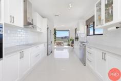 2 Reid Street East Maitland NSW 2323 $849,000 - $899,000 Discover your dream home at 2 Reid Street, East Maitland, NSW 2323, where modern living meets sublime comfort. This beautifully presented residence unfolds over two magnificent levels, each offering panoramic valley views that promise to take your breath away. Nestled on a generous 632 square metre plot, this home is an oasis for families, home business owners, and teenagers seeking their own space. The property features three well-appointed bedrooms, each complemented by three sleek and stylish bathrooms, including fully renovated ensuites and main bathroom facilities. The heart of the home is undoubtedly the designer kitchen, showcasing stone benchtops, a high-quality Euromaid oven, a 4 burner ceramic cooktop, and a Bosch dishwasher, perfect for creating culinary delights. A vast downstairs area, approximately 150m2, presents a world of possibilities. It could be transformed into an idyllic teenage retreat, a spacious area for a thriving home business, or even a massive garage or workshop for the hobbyist or entrepreneur. Comfort is assured year-round with a ducted Daikin air conditioner and multiple split systems, while new carpeting and fresh paint add a touch of elegance and warmth throughout. With two parking spaces to cater for vehicles, this property ticks all the boxes for convenience, style, and functionality. Embrace the space, relish the views, and make 2 Reid Street your new home.