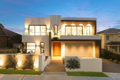 17 Phillip Rd Putney NSW 2112 From the finest finishes to the dramatic sculptural form, this stunning masterpiece is a one-of-kind jewel conceived by JRC Projects. This bespoke luxury home infuses commercial grade concrete & galleries of glass to reveal a multitude of lavish living zones that adapt the modernist family needs. Every room engages the outdoors opening to central courtyards or professionally landscaped gardens. Set on a large 879sqm parcel, this home promises a resort lifestyle with water-views to Parramatta River and beyond. Features: - Unique & special, one of the finest homes in Putney - Full brick, concrete slabs, 3m ceilings, ducted air-con - Sweeping living/dining rooms framed by walls of glass - Innovative in-ground concrete pool, integrated alfresco BBQ - Top of the range designer kitchen, Miele appliances, butlers pantry - Premium Italian tiles, Clipsal Saturn electricals, Realflame heater - Expansive cascading gardens, central zen courtyard with seating - Dedicated cinema with hi-end Epson & Paradigm theatre system - Formal sitting room, wide hallways, upper floor family rumpus - Breathtaking master suite occupies entire rear wing, water-views - Quartz finished luxury bathrooms, stone vanities, designer lighting - King sized bedrooms, most with private balconies, custom robes - Bespoke cedar doors, stairs & ceilings, sleek signature JRC facade - Custom cabinetry, video intercom, auto garage, auto gates - Close to waterfront parks, ferry, Putney shops, schools & buses It's now or never, this once in a lifetime opportunity will not repeat itself.