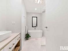 23A Telopea St Booker Bay NSW 2257 $1,450,000 Welcome to 23a Telopea Street, Booker Bay this front villa of two is truly unique in design and extraordinary in finishes. You will be impressed by the space, natural light, construction and quality finishes the moment you enter the oversized New Guinea Rosewood pivot front door. The villa features include: - Three bedrooms all with full ceiling height robes, NBN Ports and ceiling fans the main with ensuite bathroom - A designer contemporary kitchen with extraordinary, cantilevered polished concrete island bench, Fisher Paykel appliances, custom storage cabinetry, stacker servery window to the entertainment space and island bench - Two designer bathrooms with quality fittings and fixtures, timeless in design and colour palate and floating wall mounted vanities - Polished concrete floors throughout the living spaces exudes an elegance rarely seen in villa's today. The floors are complimented by the polished internal concrete walls and the ceilings that are raked to a height of approximately 4 meters that accentuate size, space and light - Internal laundry with custom cabinetry - Additional features include ducted air conditioning throughout for heating and cooling, solar panels, louvred windows, networking switchboard with FTA, Data, phone and audio cabling installed. - The courtyard is low maintenance and flows seamlessly from the alfresco area - A large single garage has automatic door and internal access Well, what about the location you are positioned a level walk to cafes, restaurants, palm beach ferry, local theatre and the Ettalong Beach town centre and beachfront.