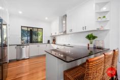6 Seaside Close Korora NSW 2450 $1,050,000 to $1,150,000 Experience the best of beachside living with this spacious 4-bedroom, 3-bathroom home with a study, located in the highly desirable suburb of Korora. Just a short walk from the beach and Korora Primary School, this property provides an ideal coastal lifestyle. Its flexible layout includes a self-contained lower level with a bedroom, living area, and bathroom-perfect for extended family or guests. The upper level features three additional bedrooms, including a main with an ensuite, main bathroom, study, a modern kitchen with stone benchtops, and generous living and dining spaces. Timber floors add warmth throughout, while vaulted ceilings in select areas create an airy feel. The north-facing verandah, accessible from the main living area and the main bedroom, is perfect for soaking up the sun, while the rear deck leads to a private pool area set in a tranquil, elevated setting. With ample side yard space that can be easily fenced for security, this home offers a perfect blend of comfort and privacy. Just a 5-minute drive from Coffs Harbour, this property is set for auction, with the owners open to considering offers prior.