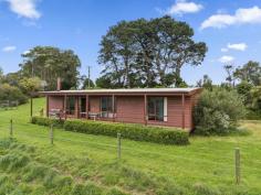 285 Falls Rd Stony Creek VIC 3957 $770,000 Set on approximately 1.2 hectares of fenced land, sited to capture expansive views over the surrounding countryside and the picturesque valley setting. Cedar ranch style home with decks on each side, offering a sheltered space to sit and enjoy the outlook. Open plan living room with exposed beams and raked ceiling, dado paneling and wood heater for the cooler months. Well appointed kitchen with breakfast bar to meals area. 3 fitted bedrooms - master with ensuite. Main family bathroom, laundry / utility room, separate w.c. LU garage /workshop, fenced paddock with water trough ideal for horses or running a few stock. Pretty established gardens and space to add a large vegetable patch or orchard. Brilliant central location just 6 minutes from the Fish Creek village, 20 minutes to the pristine beaches and access gates to the iconic Wilsons Prom national park. With the adjoining farmer currently utilizing the paddock, this is an ideal holiday home offering country charm without the upkeep requirements.