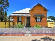36 Raff Street Toowoomba City QLD 4350 Discover the convenience of living here! Yes you can leave the car at home and walk to the CBD, cafes, schools and Queens Park. This is your chance to secure an entry level property with character & charm. Offers high ceilings, VJ's and wide pine floor boards, 4 generous size bedrooms, spacious lounge and separate dining The modern kitchen features 2 pac cabinetry, dishwasher and the stove recessed in original fireplace, fully lined attic/storage plus laundry/utility room. Set on an easy care allotment with 2 street access & double carport. Live here today and enjoy the lifestyle of inner city living!!
