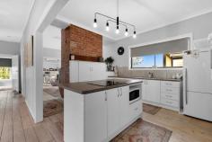 94 Rowe Street Ouyen VIC 3490 $335,000 - $365,000 Extensively renovated two bedroom, two bathroom home on 2,625m2 (2/3 acre). Brand new kitchen and bathroom, repainted inside & out and all stumps have been replaced with concrete plus 3 new split systems for heating/cooling and four separate living areas. The long list of features include white washed polished floorboards throughout, new lighting & blockout blinds, exposed brickwork in the kitchen & dining along with new colorbond roof and side veranda. Secure rear yard with double gate access, retaining walls, brick paths and established gardens. As shedding size is a personal preference, we have a blank canvas to build the correct sized shed for your requirements. Located within walking distance to the Ouyen Lake, while the kids can also walk to school. If you need even more room, there is ample space to extend the home on the spacious allotment. Priced to sell as the vendor is moving closer to her family for health reasons.